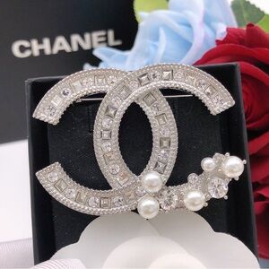 CHANEL Silver and White Crystal Brooch